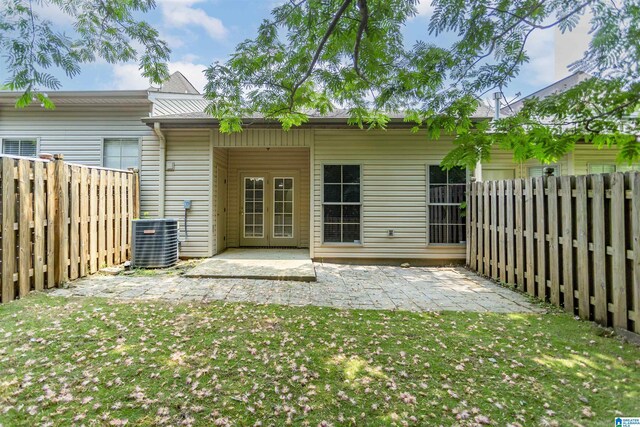 2449 Ridgemont Dr, Birmingham, AL 35244 - back of property with cooling unit and a patio