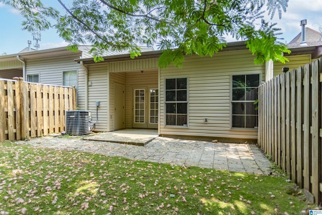 2449 Ridgemont Dr, Birmingham, AL 35244 - back of property with central AC and a patio area