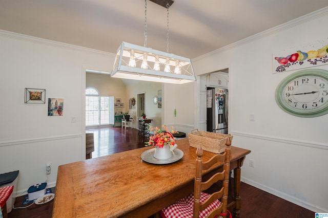 1121 Colonial Dr, Alabaster, AL 35007 - dining room featuring ornamental molding, dark wood-type flooring, and baseboards