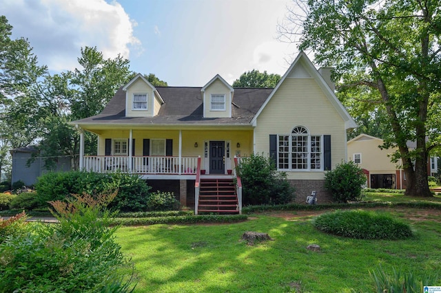 1121 Colonial Dr, Alabaster, AL 35007 - cape cod house featuring stairs, a front yard, and a porch
