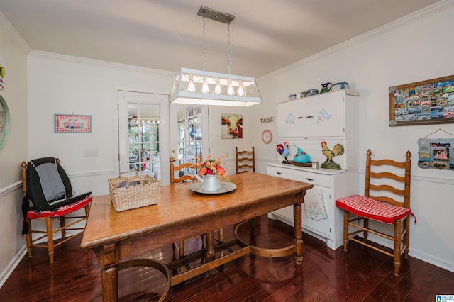 1121 Colonial Dr, Alabaster, AL 35007 - dining space featuring crown molding, dark wood-type flooring, and baseboards