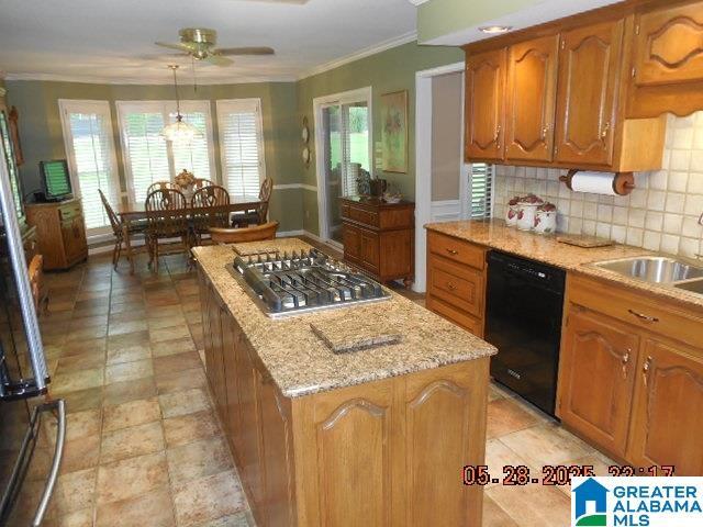 222 Odum Crest Ln, Hoover, AL 35226 - kitchen with dishwasher, stainless steel gas cooktop, ornamental molding, a kitchen island, and a sink