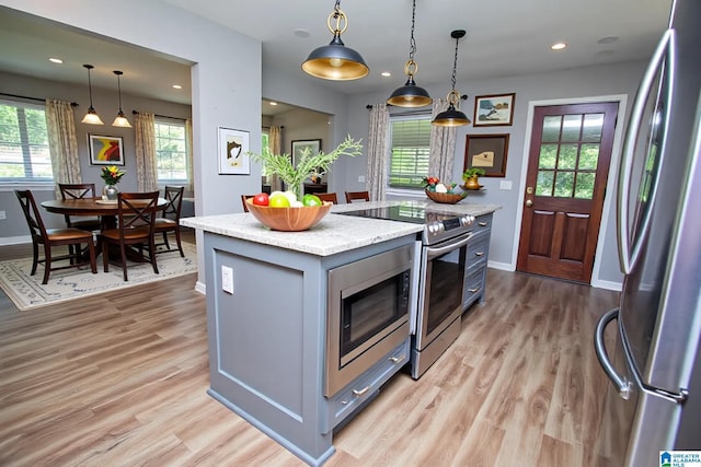 3501 Pineland Dr, Birmingham, AL 35243 - kitchen with stainless steel appliances, gray cabinets, light wood finished floors, and recessed lighting