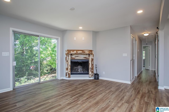 3501 Pineland Dr, Birmingham, AL 35243 - unfurnished living room with attic access, a fireplace, wood finished floors, baseboards, and recessed lighting