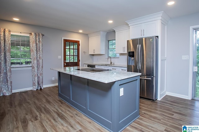 3501 Pineland Dr, Birmingham, AL 35243 - kitchen with stainless steel fridge with ice dispenser, a sink, a kitchen island, dark wood-style flooring, and recessed lighting