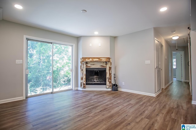 3501 Pineland Dr, Birmingham, AL 35243 - unfurnished living room with attic access, wood finished floors, a fireplace, baseboards, and recessed lighting