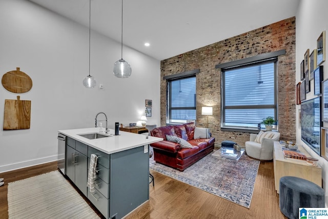 1801 2nd Ave N Unit 309, Birmingham, AL 35203 - living room with dark wood-style floors, baseboards, and a towering ceiling