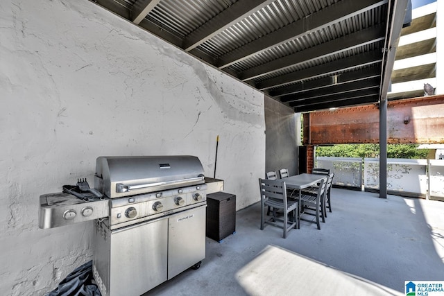1801 2nd Ave N Unit 309, Birmingham, AL 35203 - view of patio featuring outdoor dining area and area for grilling
