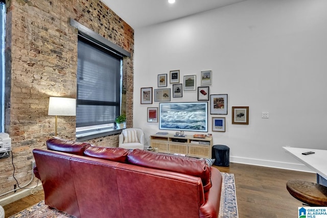 1801 2nd Ave N Unit 309, Birmingham, AL 35203 - living room with wood finished floors, baseboards, and recessed lighting