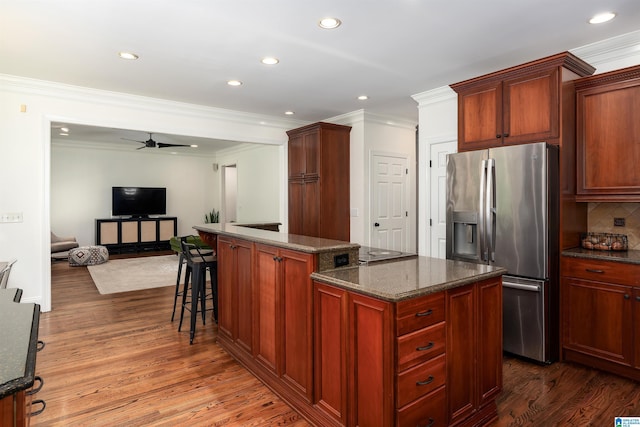 2032 Forest Meadows Cir, Birmingham, AL 35242 - kitchen featuring stainless steel refrigerator with ice dispenser, crown molding, dark wood-style floors, open floor plan, and recessed lighting