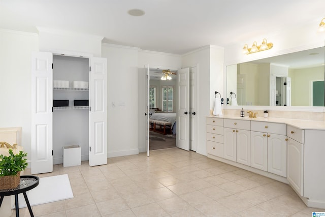 2032 Forest Meadows Cir, Birmingham, AL 35242 - bathroom featuring vanity, ornamental molding, ceiling fan, tile patterned flooring, and ensuite bathroom