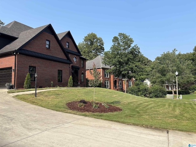 2032 Forest Meadows Cir, Birmingham, AL 35242 - view of front facade featuring brick siding, a front lawn, and driveway