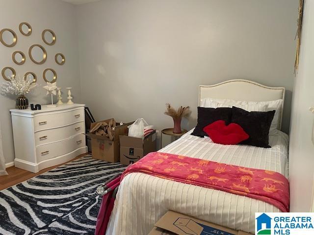 2213 Montreat Cir Unit D, Vestavia Hills, AL 35216 - bedroom featuring wood finished floors and baseboards
