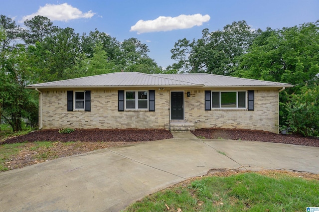 2016 NW 9th Pl, Center Point, AL 35215 - ranch-style home with brick siding and metal roof