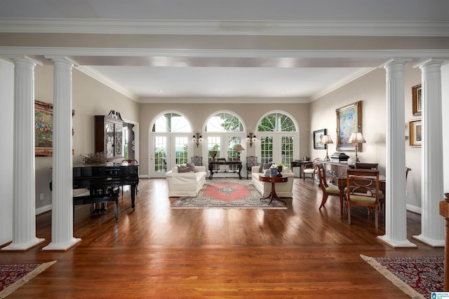 5601 Canongate Ln, Birmingham, AL 35242 - living area with decorative columns, healthy amount of natural light, wood finished floors, crown molding, and baseboards