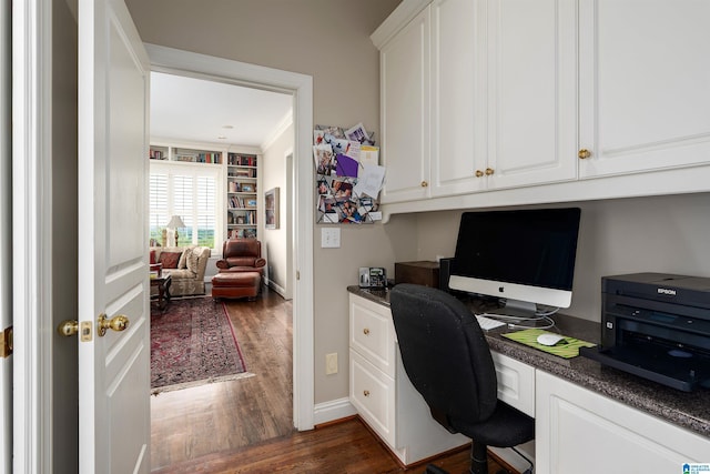 5601 Canongate Ln, Birmingham, AL 35242 - home office with built in desk, dark wood-type flooring, crown molding, and baseboards