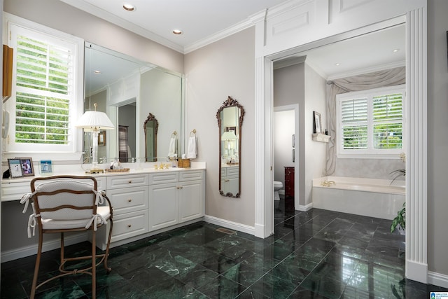 5601 Canongate Ln, Birmingham, AL 35242 - full bath featuring a garden tub, vanity, baseboards, toilet, and crown molding