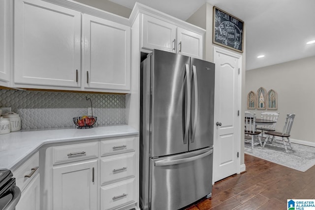 2597 Blake Way, Warrior, AL 35180 - kitchen featuring freestanding refrigerator, dark wood-style flooring, white cabinets, light countertops, and recessed lighting