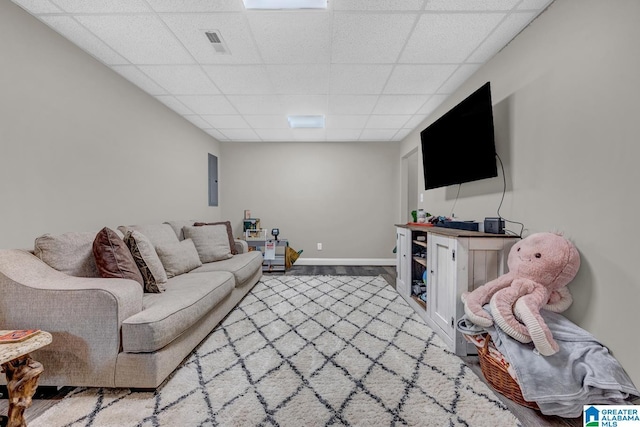 2597 Blake Way, Warrior, AL 35180 - living area with a paneled ceiling, baseboards, and wood finished floors