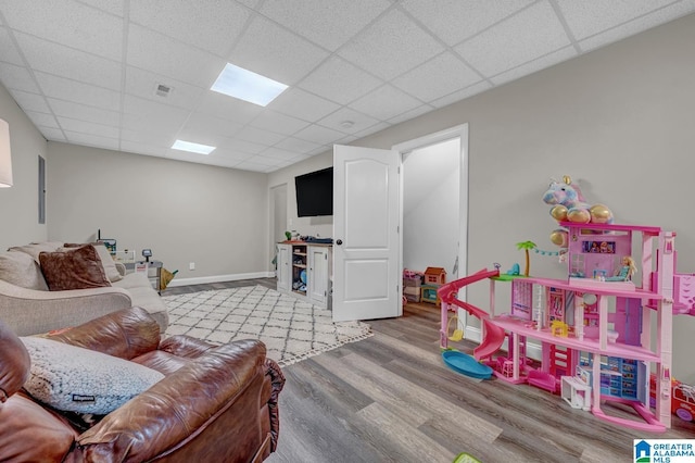 2597 Blake Way, Warrior, AL 35180 - recreation room featuring a paneled ceiling, wood finished floors, and baseboards