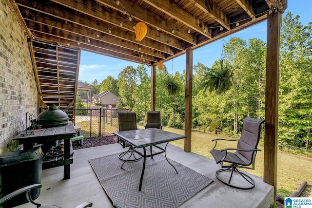 2597 Blake Way, Warrior, AL 35180 - view of patio with outdoor dining space and view of wooded area