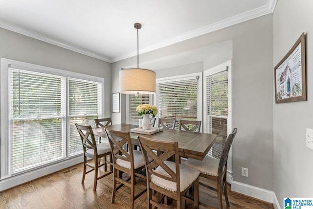 1505 Cypress Ln, Hoover, AL 35244 - dining area featuring crown molding, wood finished floors, and baseboards