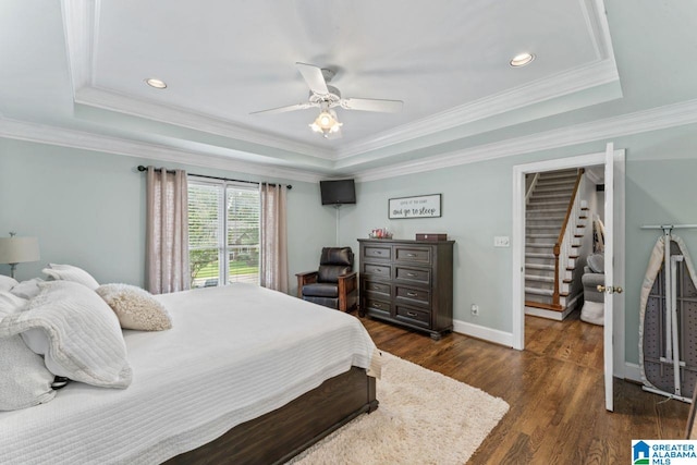 1505 Cypress Ln, Hoover, AL 35244 - bedroom with a raised ceiling, dark wood-type flooring, baseboards, ceiling fan, and ornamental molding