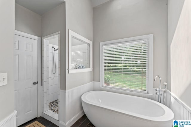 1505 Cypress Ln, Hoover, AL 35244 - bathroom featuring a wainscoted wall, a tile shower, a soaking tub, and wood finished floors