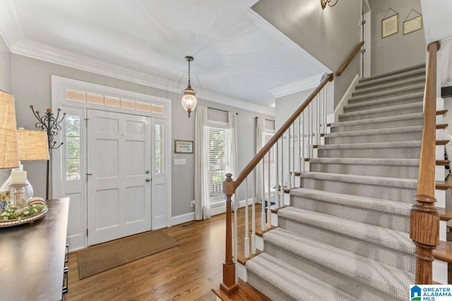 1505 Cypress Ln, Hoover, AL 35244 - entrance foyer with stairway, wood finished floors, plenty of natural light, ornamental molding, and baseboards