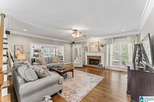 1505 Cypress Ln, Hoover, AL 35244 - living room featuring a ceiling fan, recessed lighting, a fireplace, ornamental molding, and dark wood finished floors