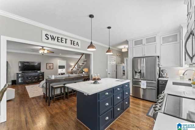 1505 Cypress Ln, Hoover, AL 35244 - kitchen featuring stainless steel fridge with ice dispenser, a sink, range, white cabinets, and crown molding