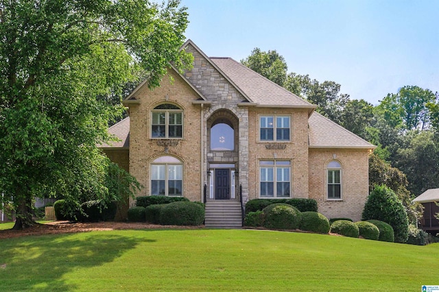 1645 Wingfield Dr, Birmingham, AL 35242 - view of front of house featuring a front yard, brick siding, and roof with shingles