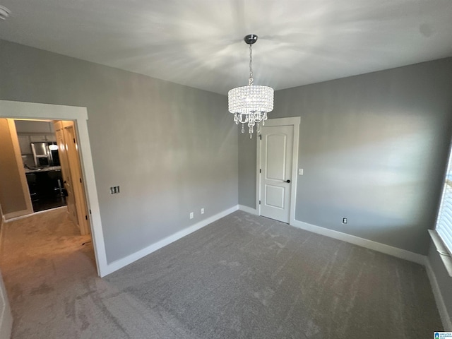 1013 Edgewater Ln, Chelsea, AL 35043 - spare room featuring carpet, a chandelier, and baseboards
