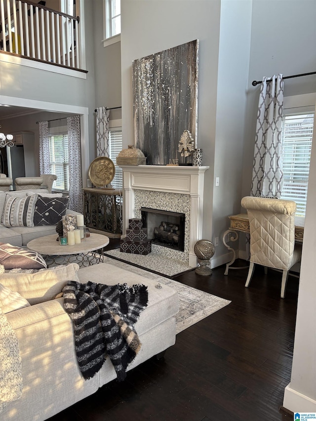 1013 Edgewater Ln, Chelsea, AL 35043 - living area with a high ceiling, hardwood / wood-style flooring, a fireplace, and a chandelier