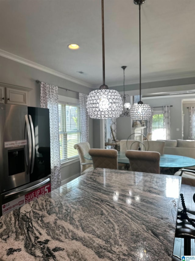 1013 Edgewater Ln, Chelsea, AL 35043 - dining space with ornamental molding and a chandelier