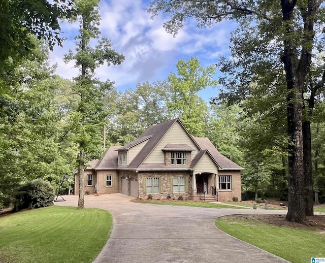 101 N Lake Dr, Hoover, AL 35242 - view of front facade with curved driveway, a front lawn, and stone siding