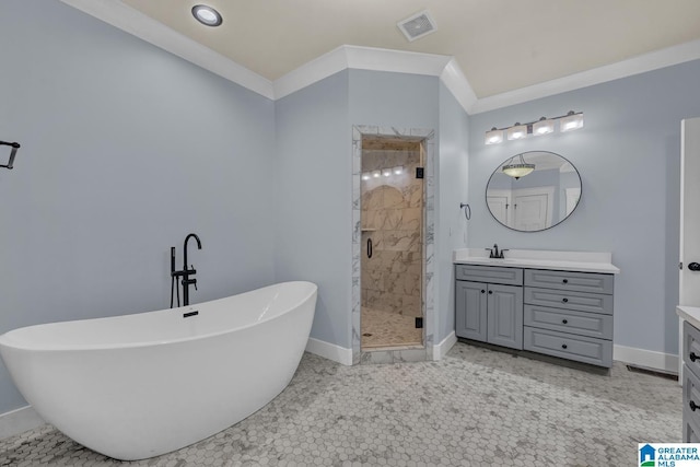 101 N Lake Dr, Hoover, AL 35242 - full bath featuring vanity, a stall shower, a freestanding tub, and ornamental molding