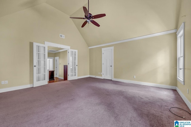 101 N Lake Dr, Hoover, AL 35242 - unfurnished living room featuring french doors, high vaulted ceiling, a ceiling fan, and carpet