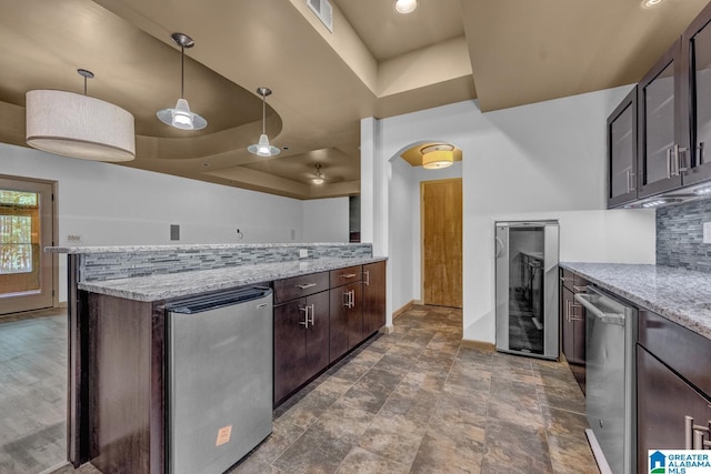 101 N Lake Dr, Hoover, AL 35242 - kitchen featuring a raised ceiling, fridge, beverage cooler, and stainless steel dishwasher