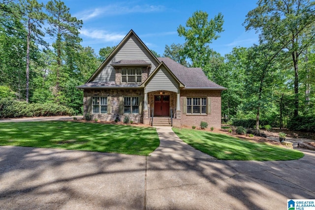 101 N Lake Dr, Hoover, AL 35242 - craftsman-style house featuring a front lawn and stone siding