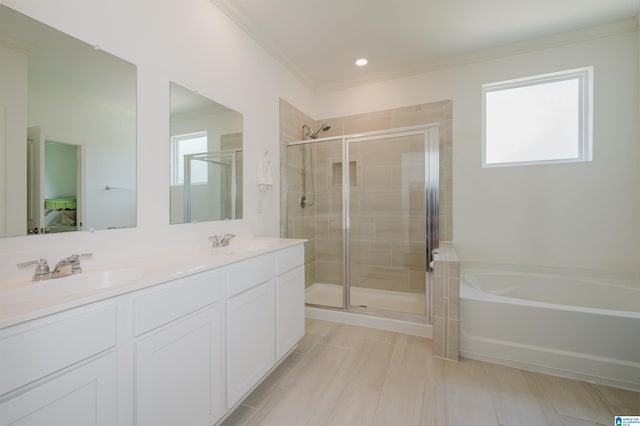 1063 Timberline Rdg, Calera, AL 35040 - bathroom featuring a shower stall, a bath, ornamental molding, double vanity, and connected bathroom