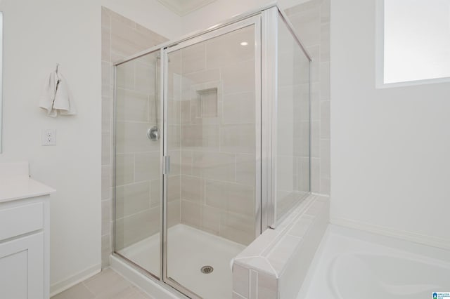 1063 Timberline Rdg, Calera, AL 35040 - bathroom featuring a shower stall, a bath, and vanity