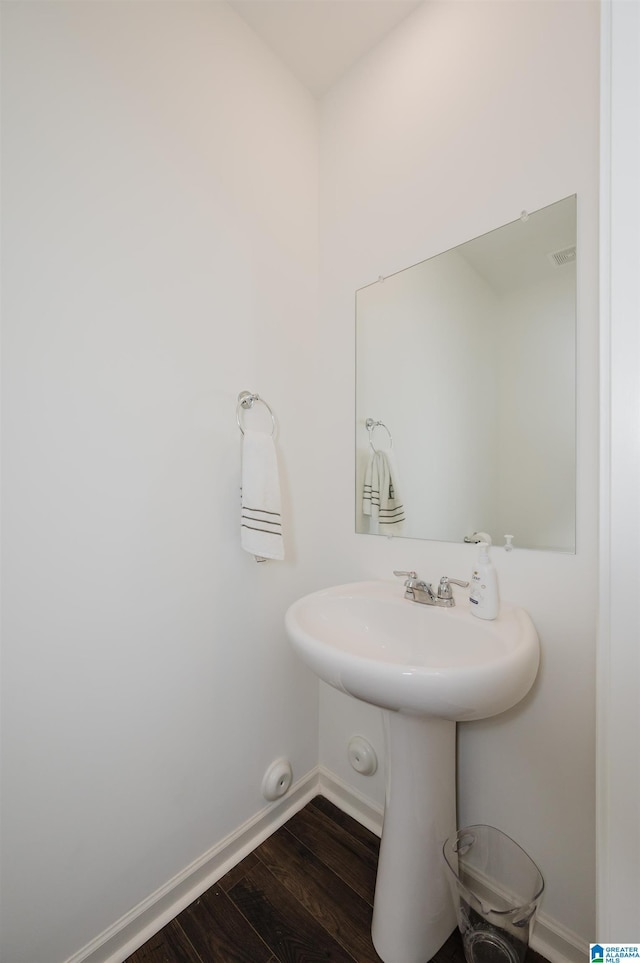 1063 Timberline Rdg, Calera, AL 35040 - bathroom featuring wood finished floors and baseboards
