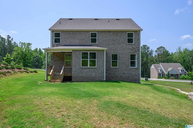 1063 Timberline Rdg, Calera, AL 35040 - back of property with a lawn and brick siding