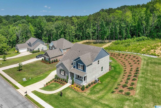 1063 Timberline Rdg, Calera, AL 35040 - aerial view of property and surrounding area with a heavily wooded area