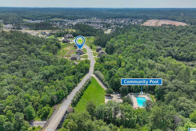 1063 Timberline Rdg, Calera, AL 35040 - drone / aerial view of a forest and a pool