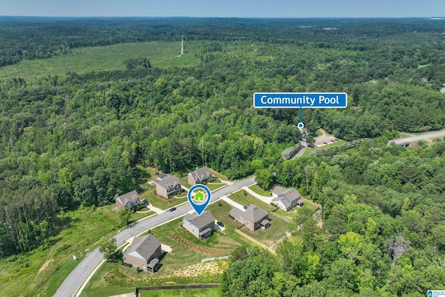 1063 Timberline Rdg, Calera, AL 35040 - aerial view of property and surrounding area featuring a heavily wooded area