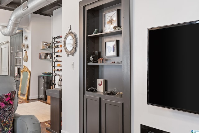 2201 1st Ave N Unit 300-C, Birmingham, AL 35203 - detailed view of wood finished floors and stainless steel double oven