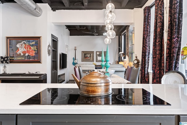 2201 1st Ave N Unit 300-C, Birmingham, AL 35203 - interior space featuring gray cabinets and black electric cooktop