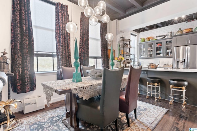 2201 1st Ave N Unit 300-C, Birmingham, AL 35203 - dining area with beam ceiling and dark wood finished floors